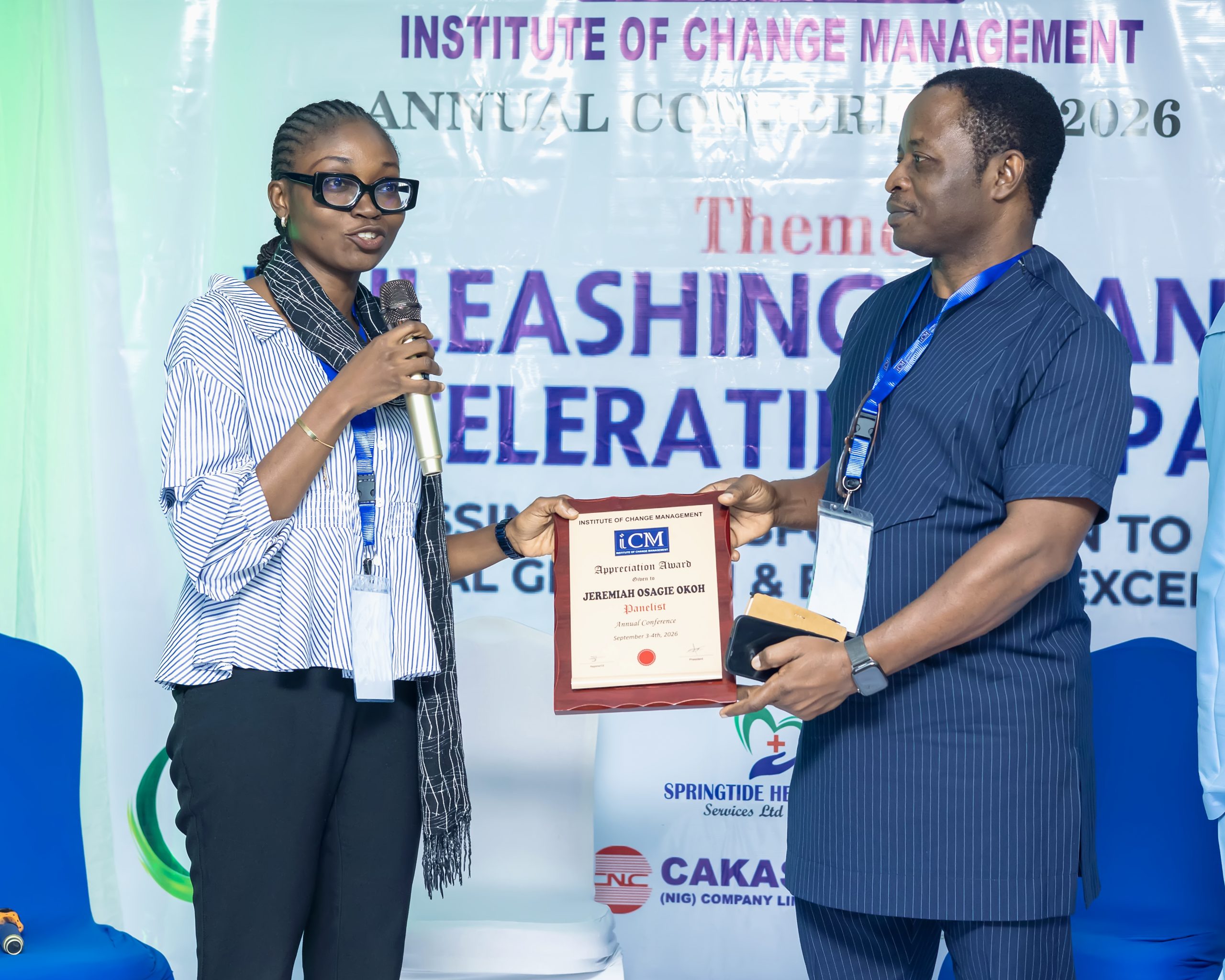 Jerry Okoh Receiving his plaque