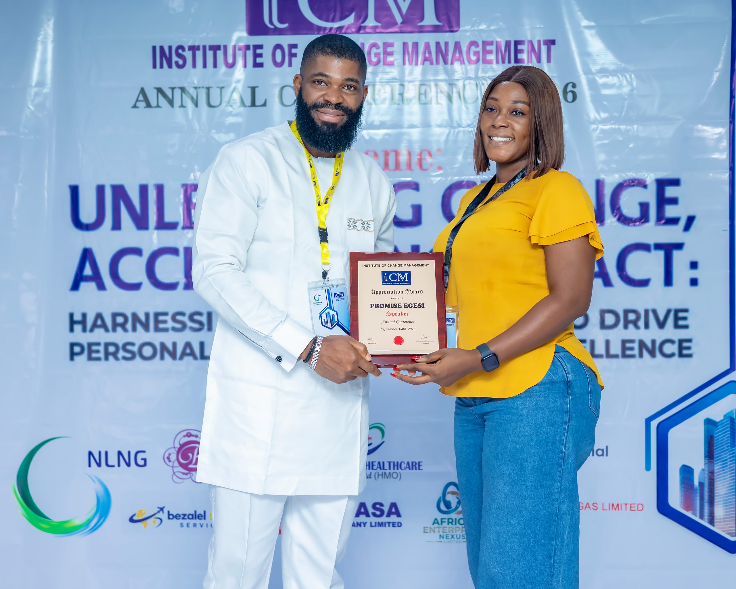 Promise Egesi receiving plaque